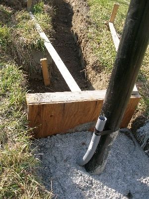 The mast and power conduit in concrete.