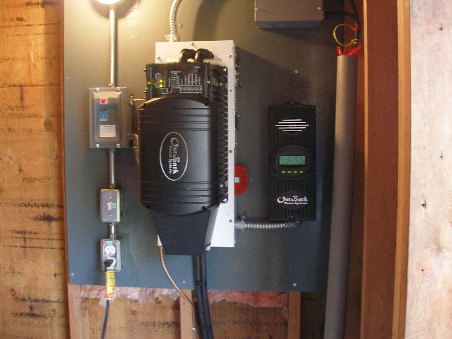 The power panel in the shed with 3500 watt outback inverter.