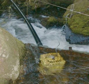 Intakes are often the hardest part of building a micro hydro project. Dealing with steep mountain streams that can carry large amounts of bed load requires carefully thought out intake structures.