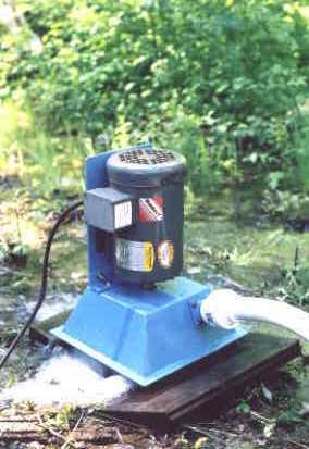 An induction motor running as a generator, and producing 500 watts of 60 hz AC. Induction systems  can transmit over long power line lengths.